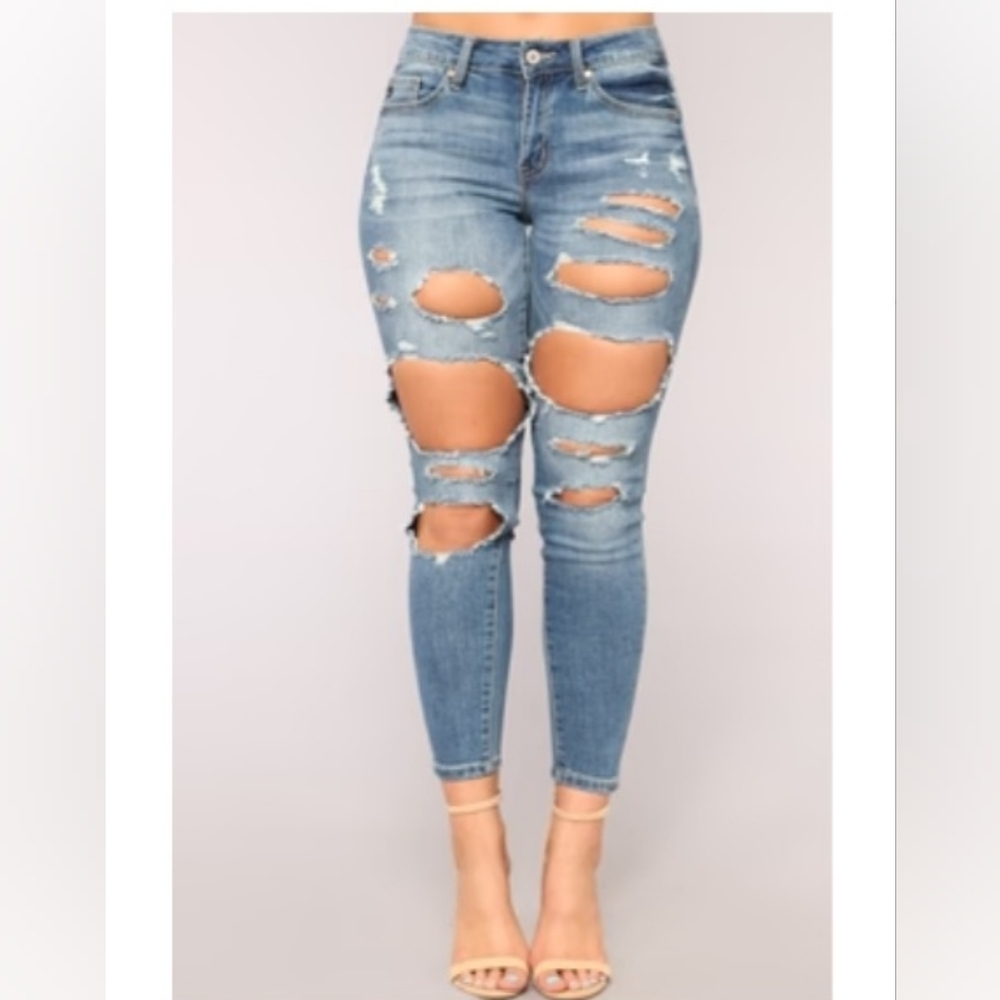 Distressed ankle skinny jeans